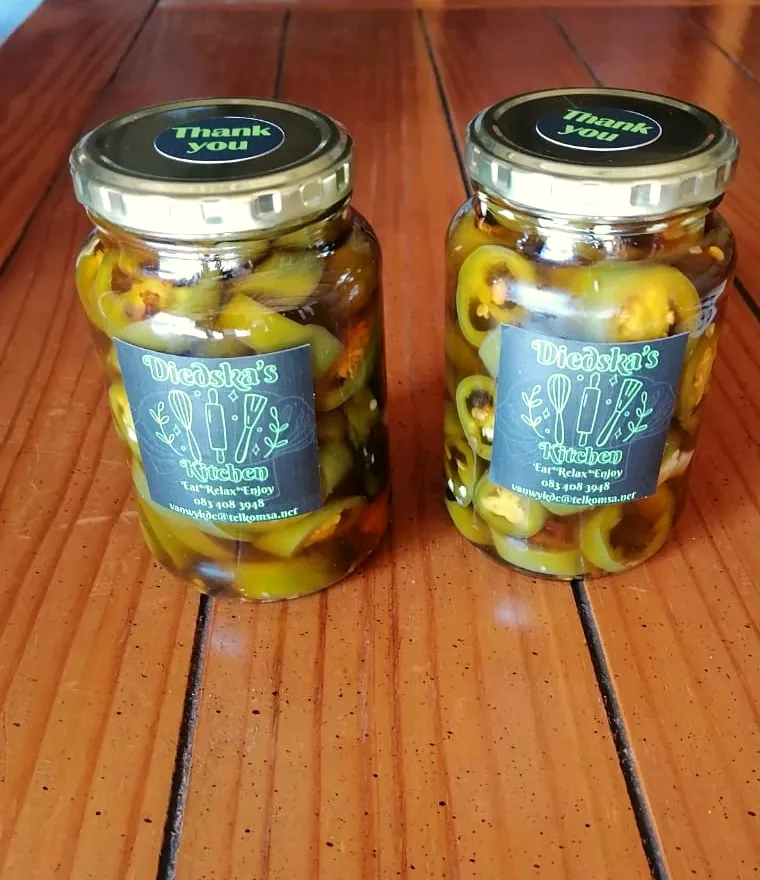Two jars of sliced pickled jalapenos