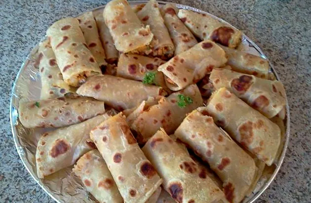 Platter of rolled mince and chicken roti